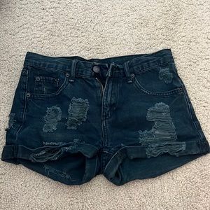 Distressed black jean shorts
